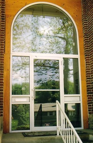 Arched transome and door with mailslot